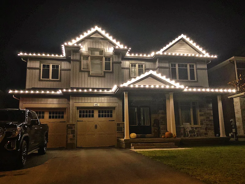 Seamless gutters on a dark exterior — Prestige Pro Home Solutions, Delta, BC